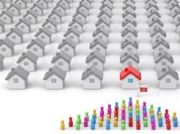 Shows a sea of houses but only one for sale while there are a sea of people looking at it. Shows the supply demand equation reflective of the current US housing shortage