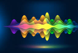 color wave on a blue background signifying a signal of light or sound