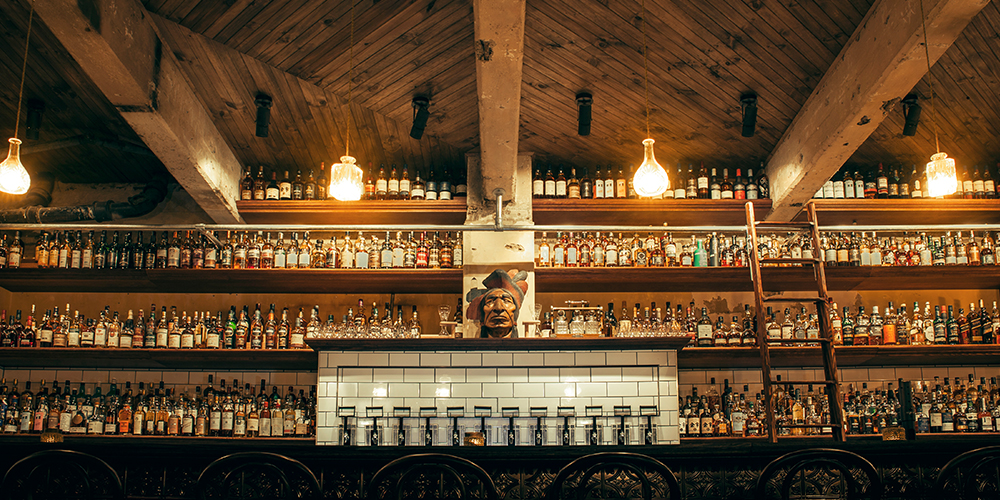 Back bar showing spirits bottles representing the growth of value-premium spirits