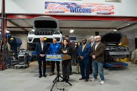 Gov. Kathy Hockel addresses a crowd to discuss Auto Insurance Reform in NYS